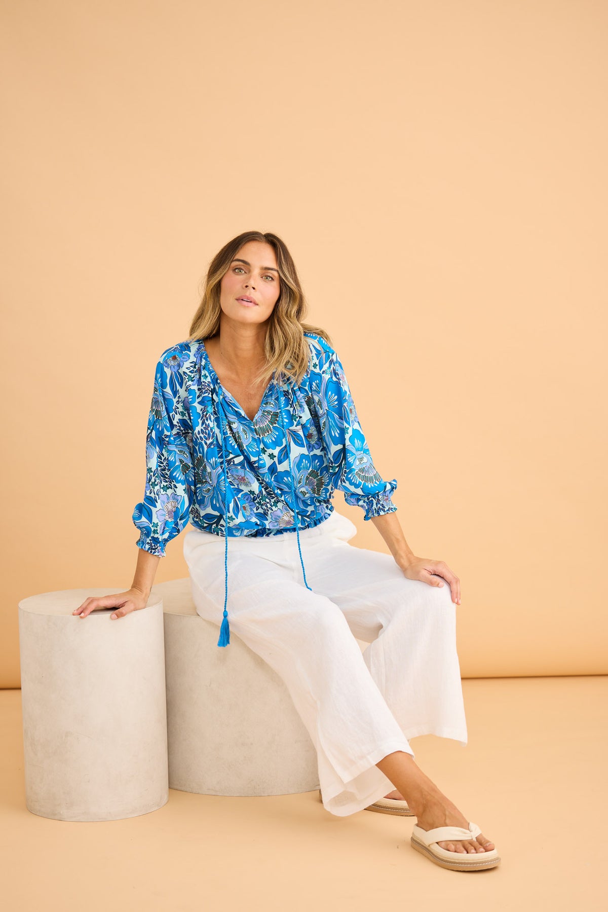 Fly Away Pant in White with relaxed wide leg.