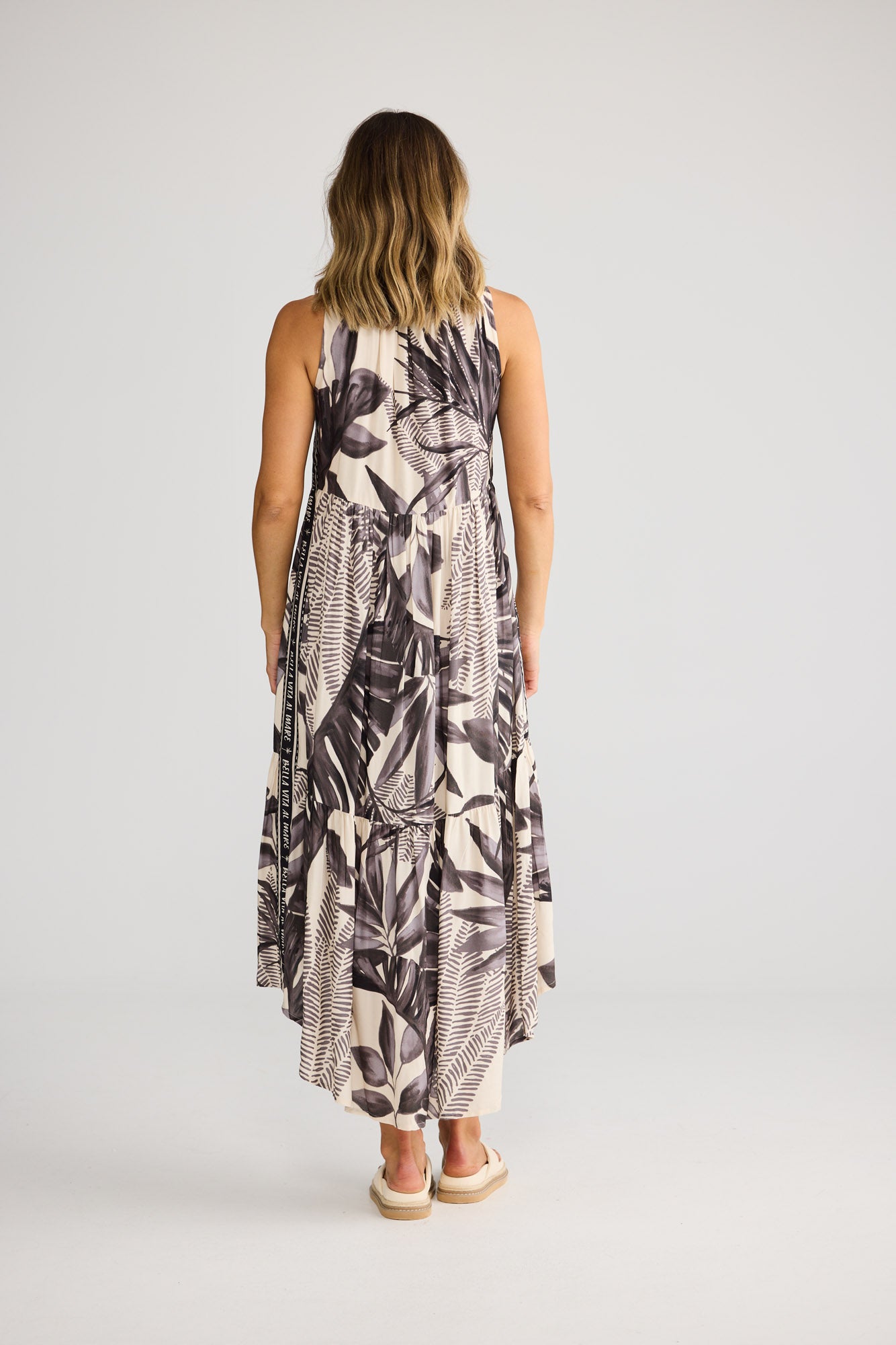 Margot Dress in Sunset Palm with loose fit.