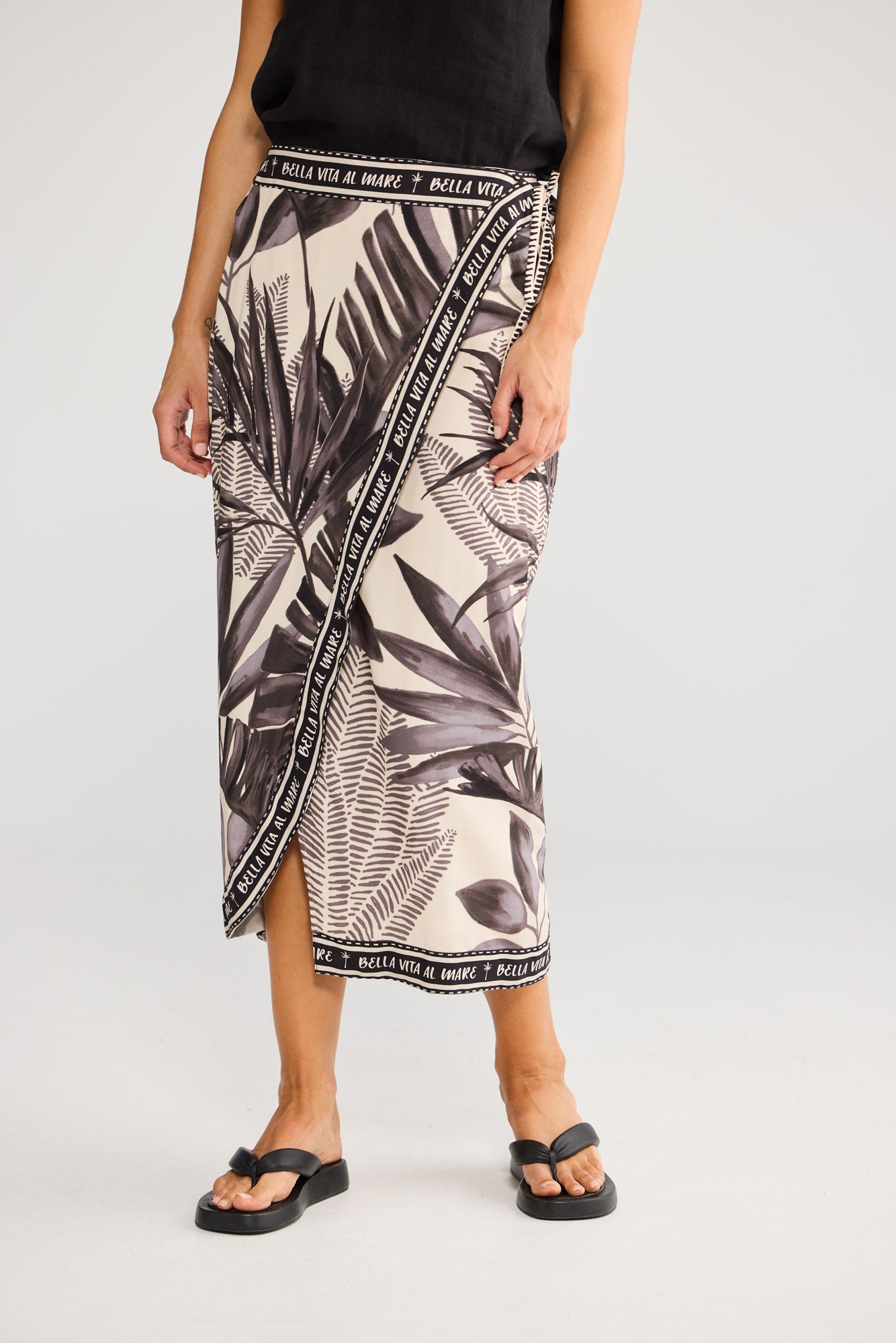 Ocean Sarong Skirt in Sunset Palm with faux wrap style with side seam ties.