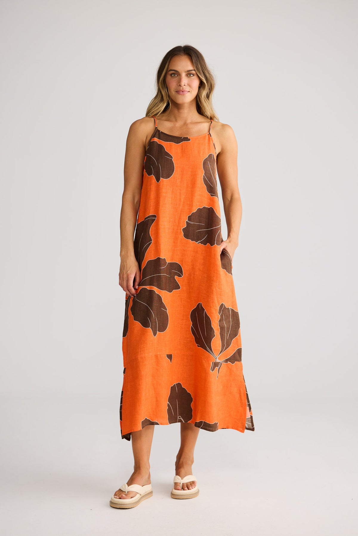 Cliffside Maxi Dress in Hibiscus Breeze with side seam pockets.