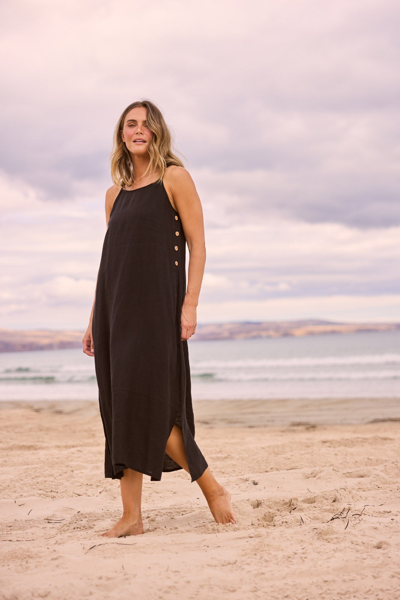 Cliffside Maxi Dress in Black with side seam pockets.