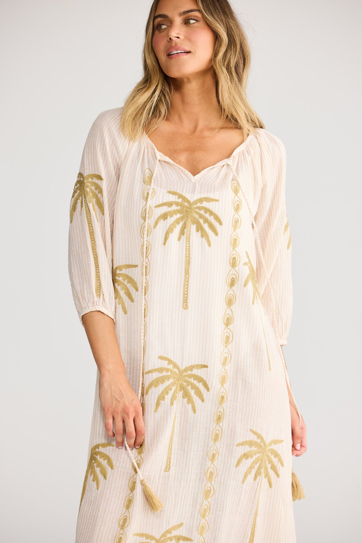 Ohana Dress in Natural Stripe with round neckline with neck ties.