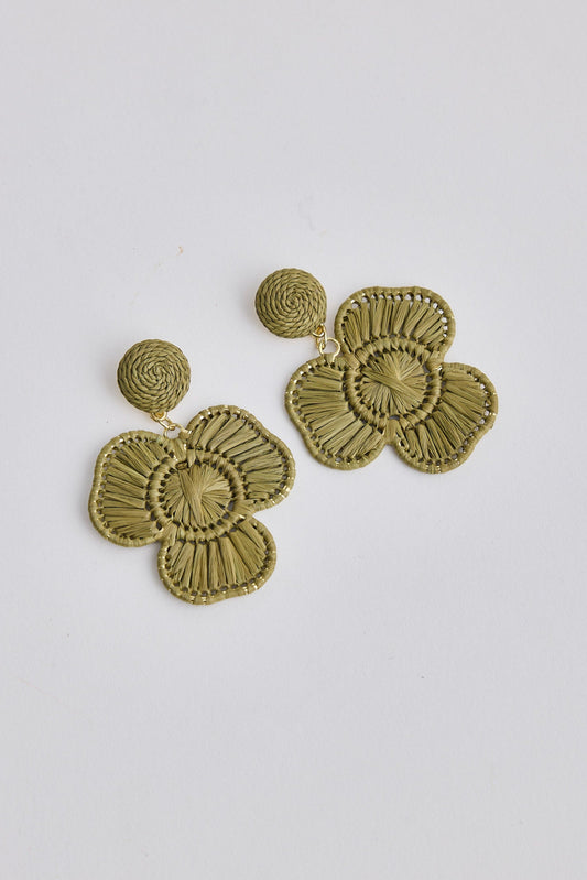 Olive colour floral earrings on a light gray background
