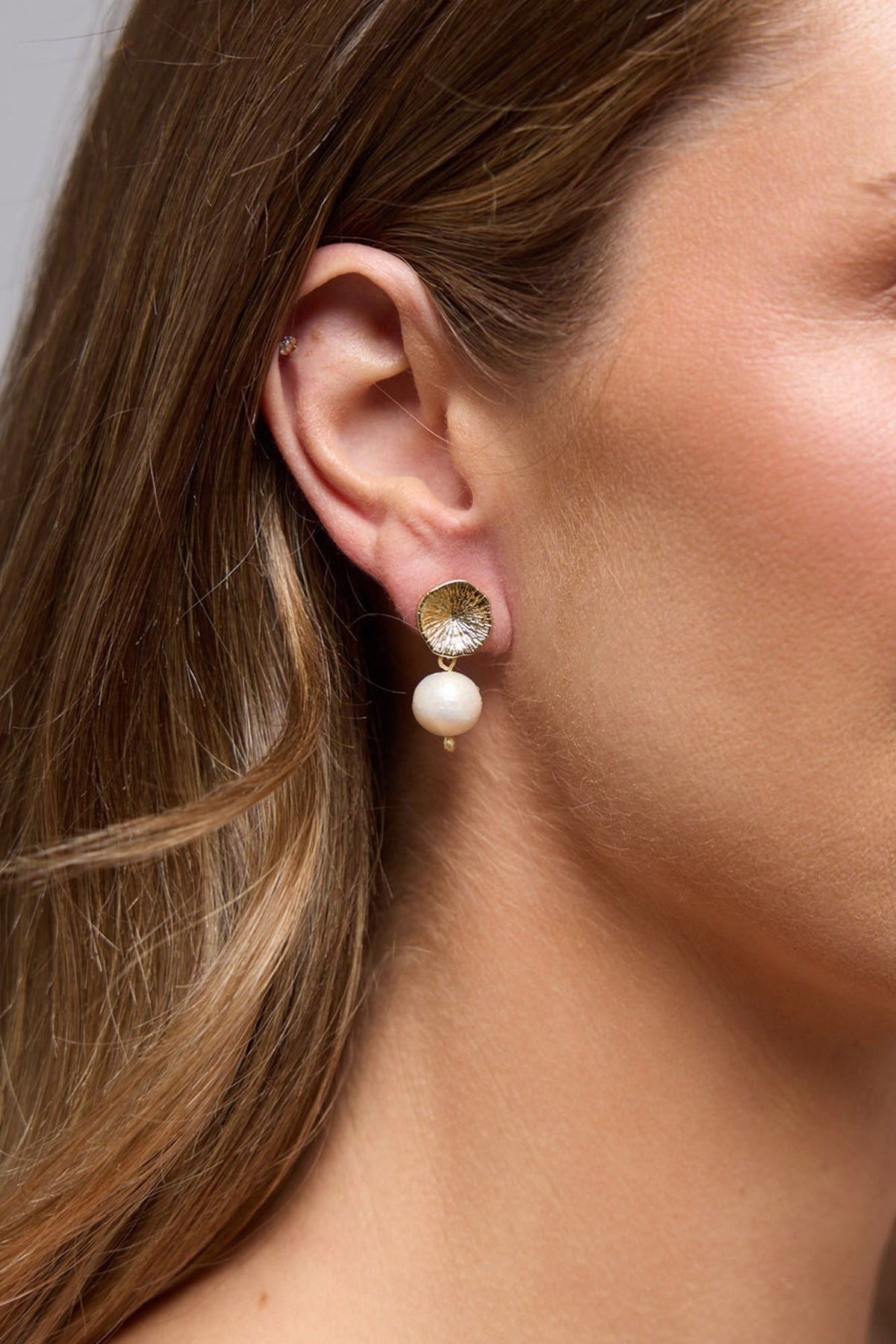Taj Earrings in white, front view.