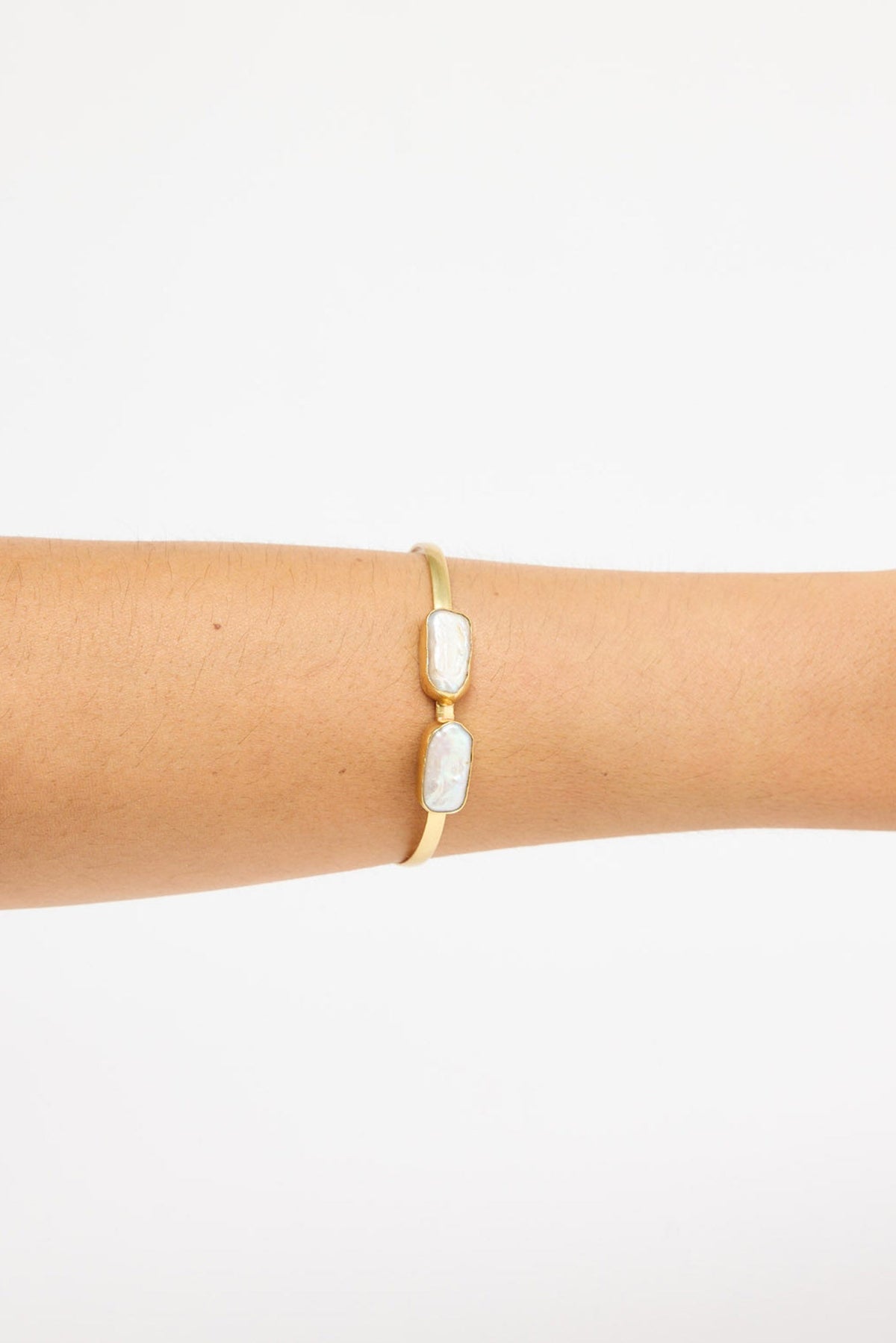 Anna Cuff bracelet in gold, front view.