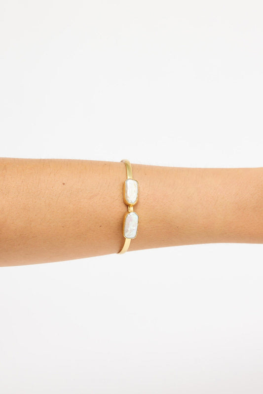 Anna Cuff bracelet in gold, front view.