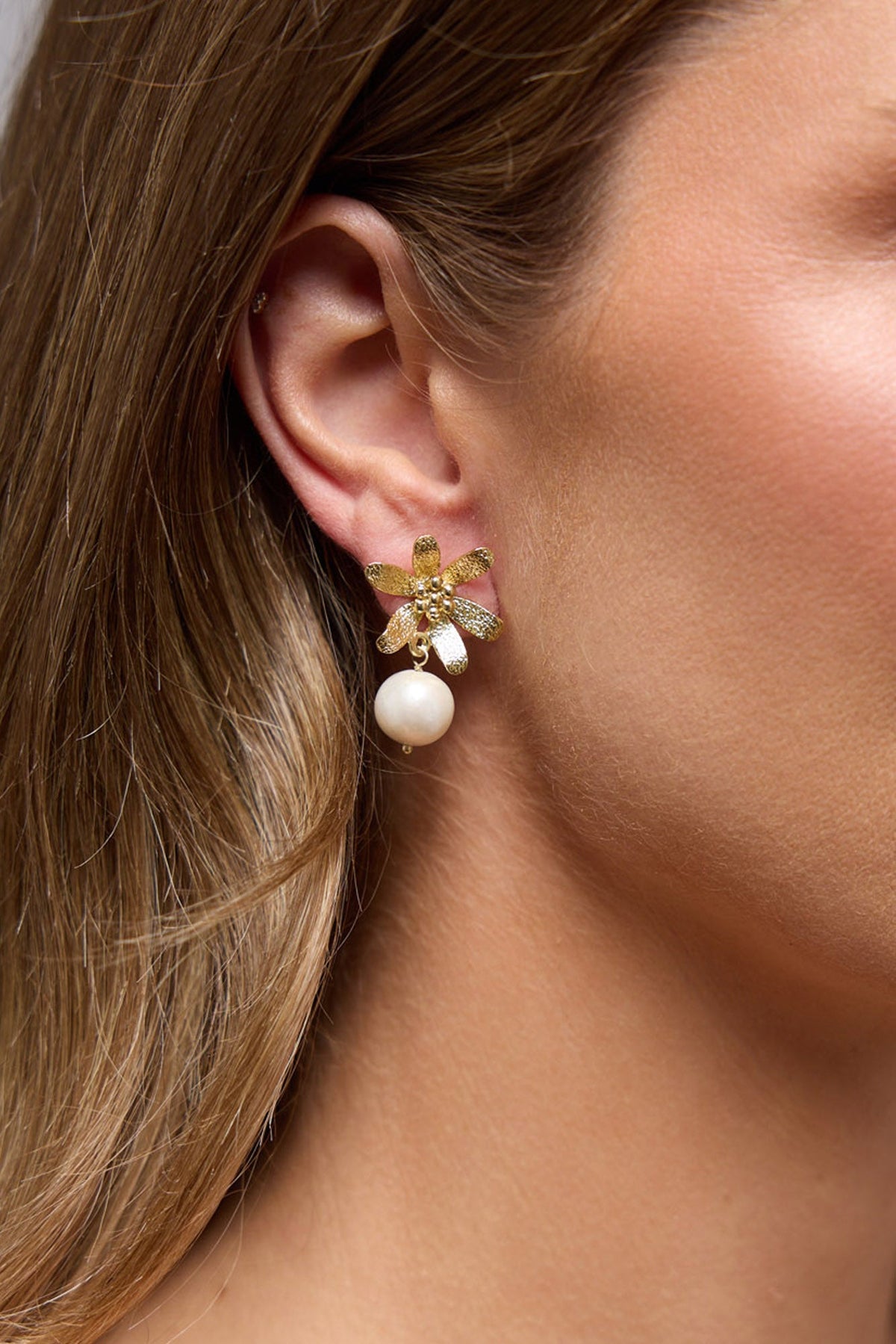 Lorena Earrings in white, front view.