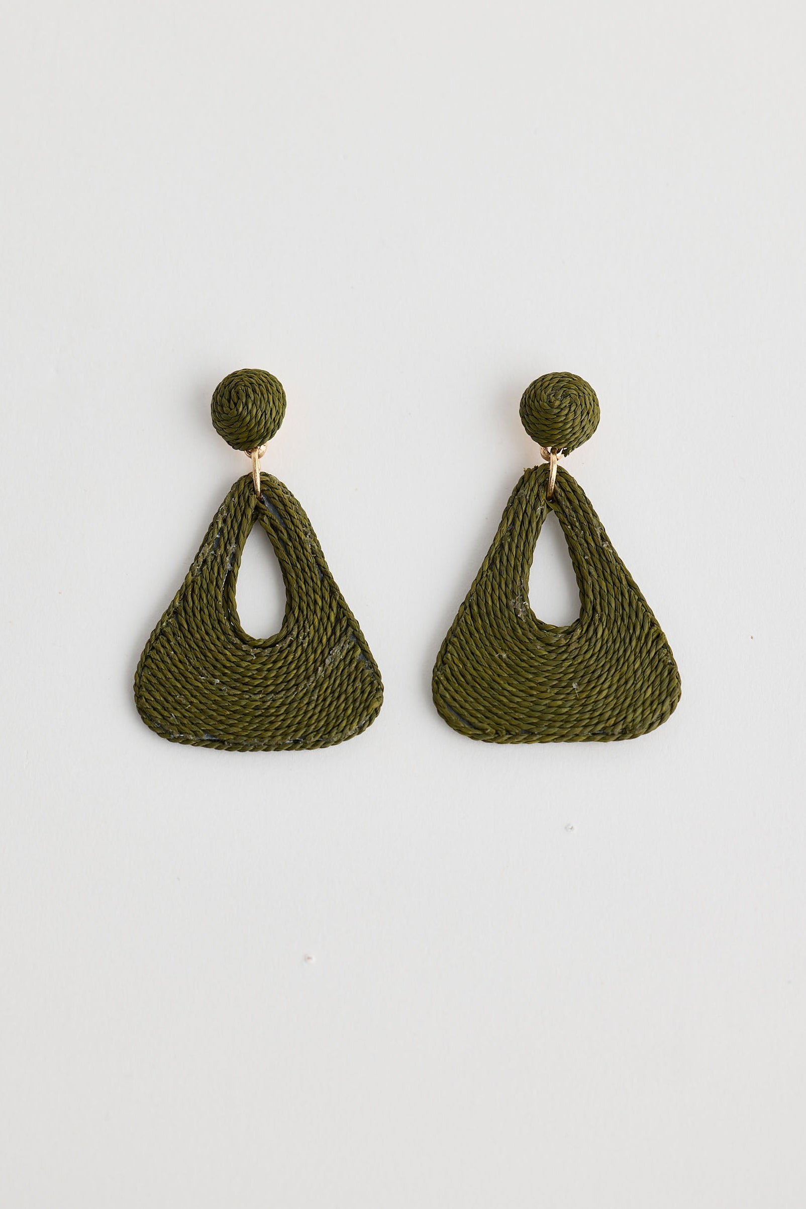 Green crochet earrings on a white background