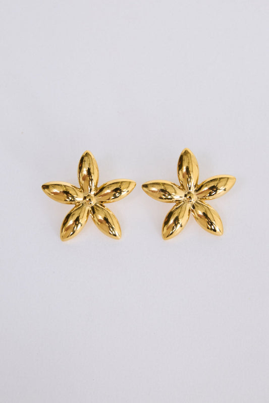 Bloom Earrings in gold with intricate detailing, angled view on white background