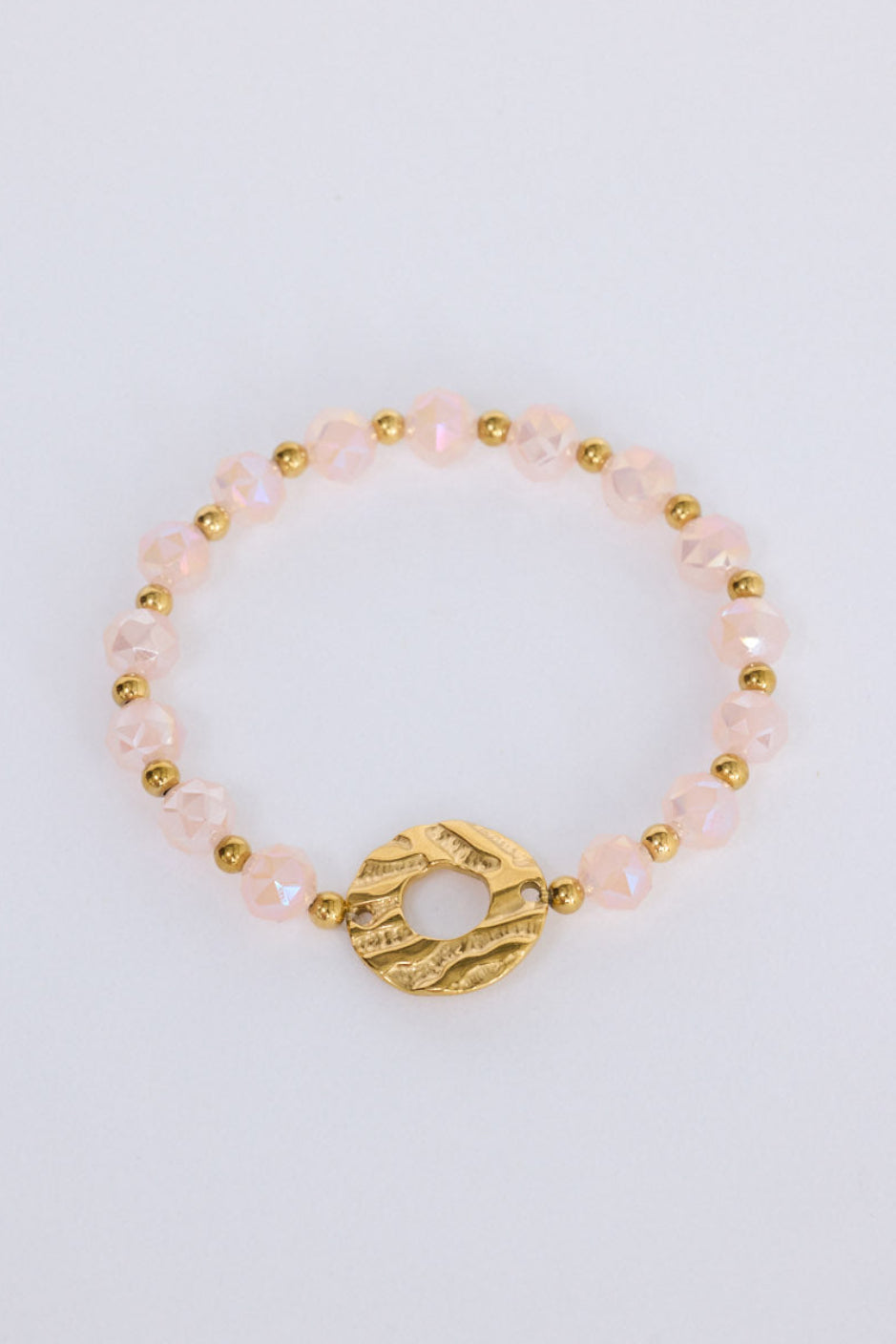 Clarke Bracelet in pink with statement gold charm detail, front view on white background
