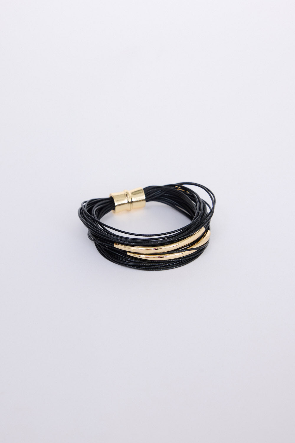 Shakira Bracelet in black with metal accent bars, front view on white background