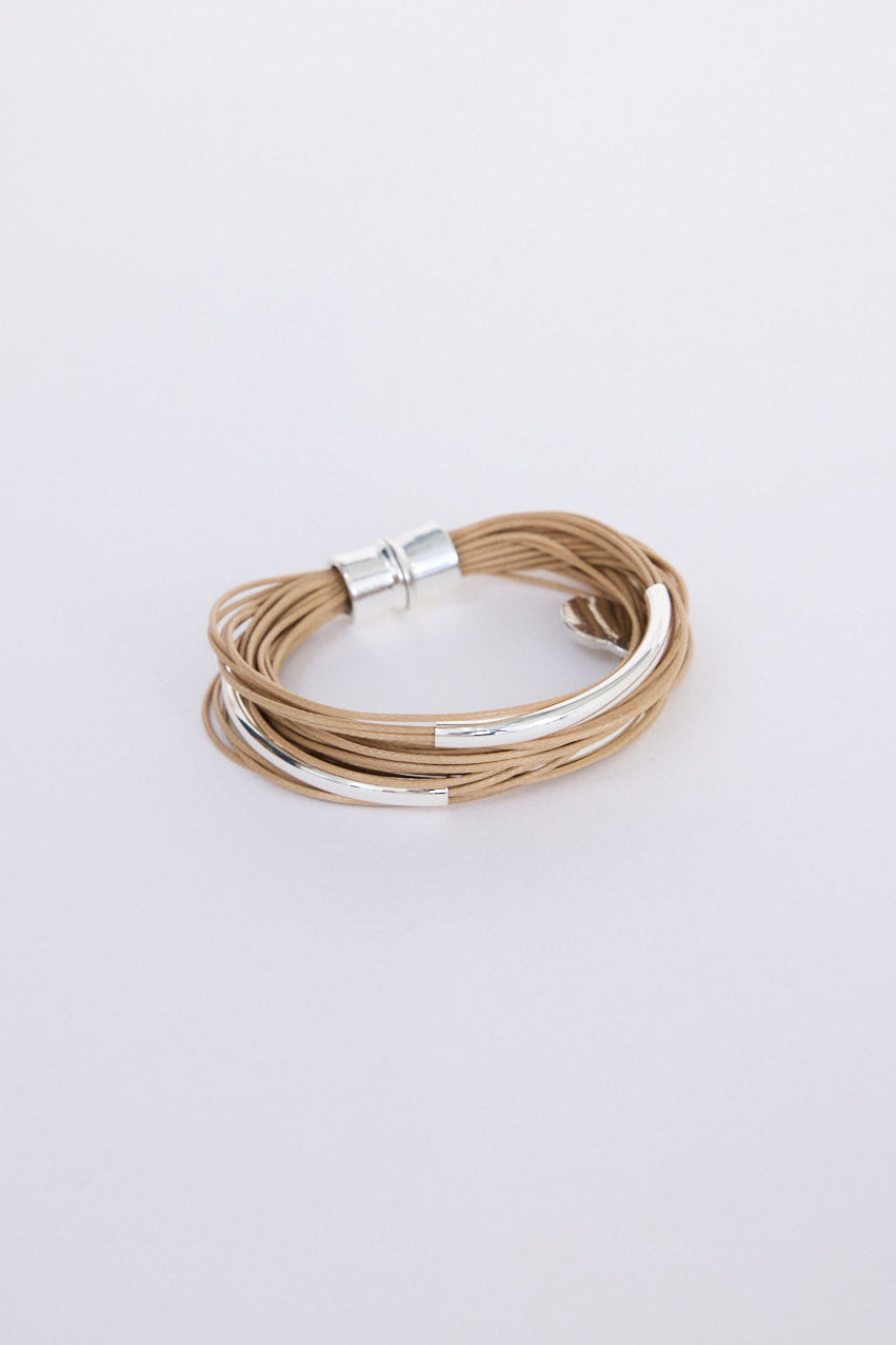 Shakira Bracelet in camel with metal accent bars, front view on white background