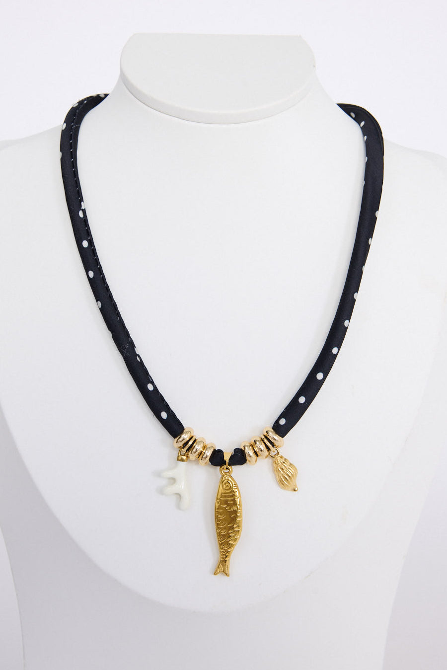 Winter Fish Necklace in black polka with statement fish charm and gold detailing, front view on white background
