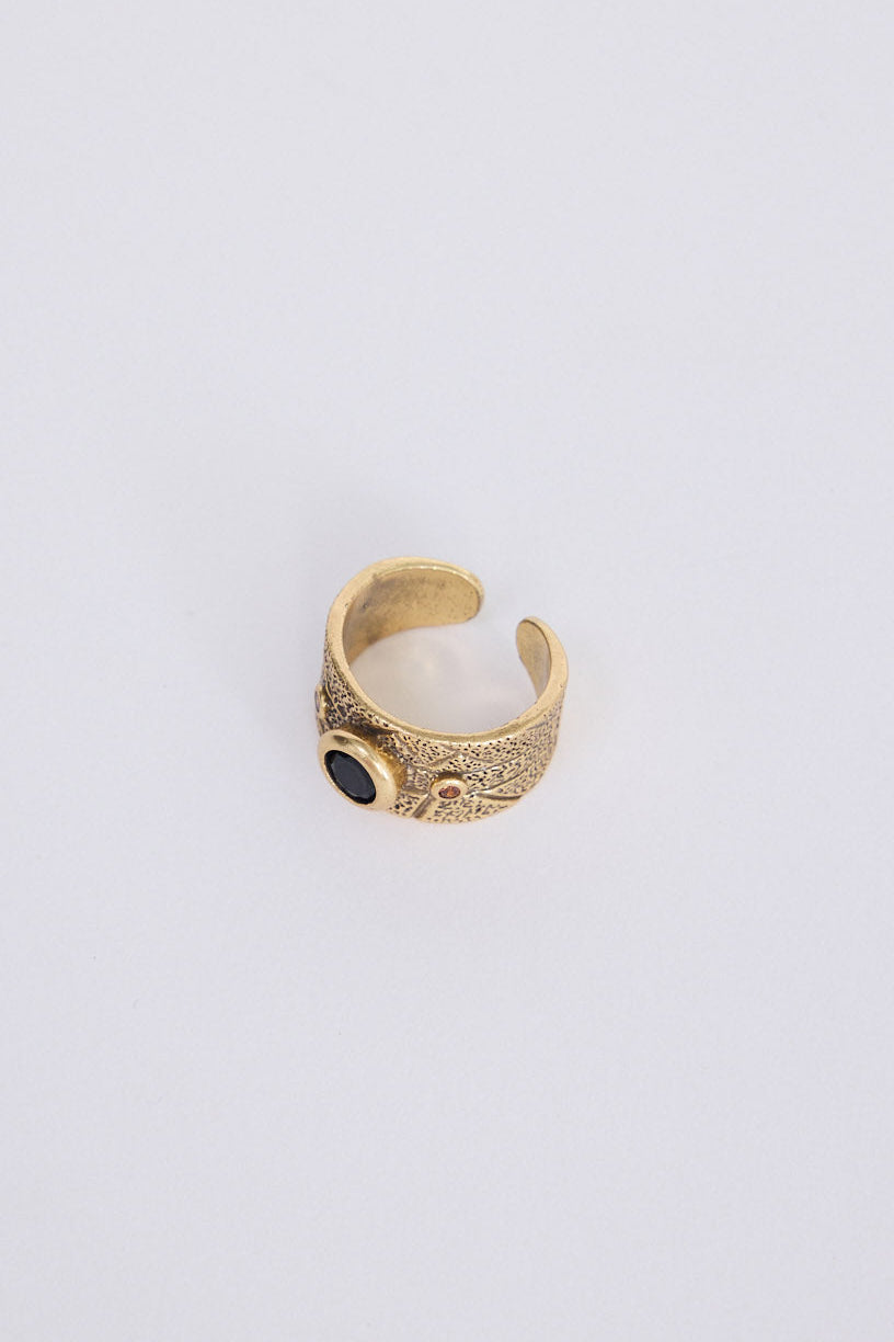 Calypso Ring in gold with stone detail, front view on white background