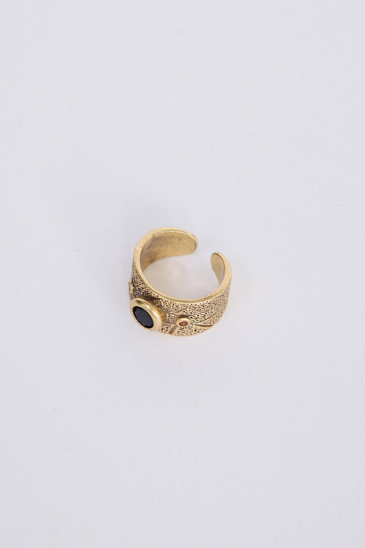 Calypso Ring in gold with stone detail, front view on white background