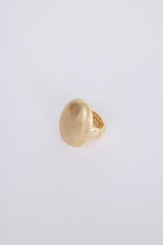Nola Ring in gold with smooth domed face and brushed texture finish, front view on white background
