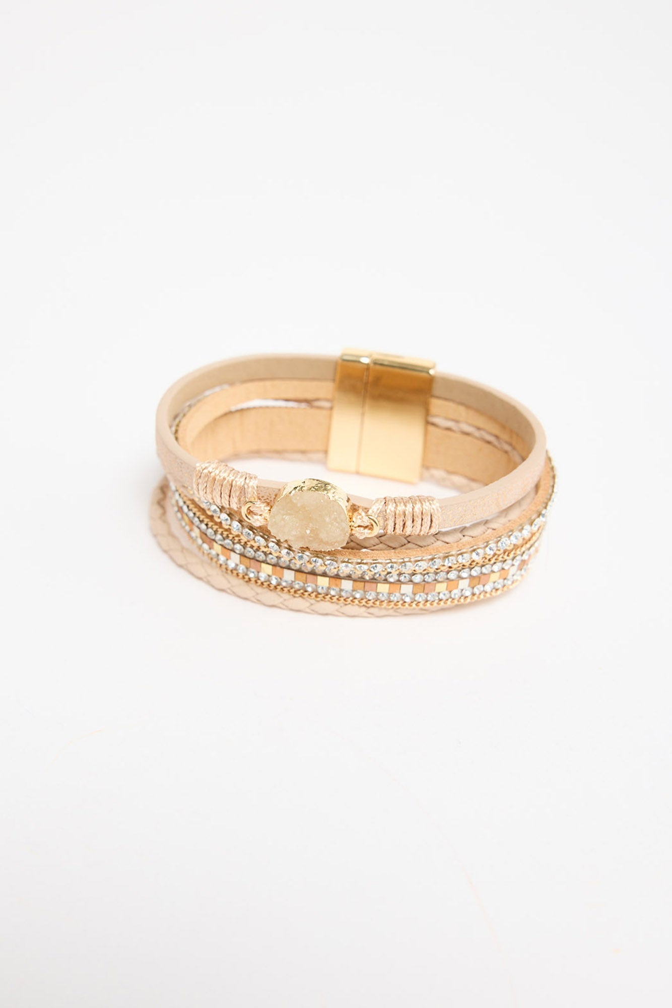 Multi-strand wrap bracelet in beige leather and crystal strands with a druzy stone charm and gold-tone magnetic clasp, shown flat on a white background