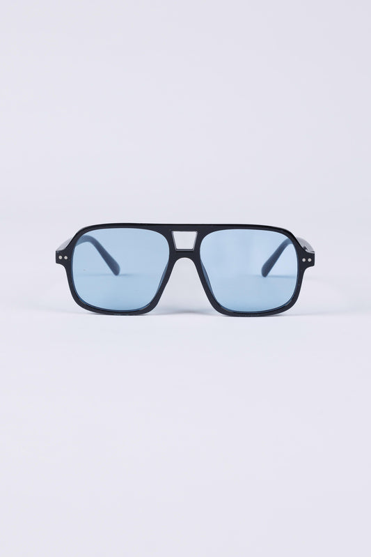 Sunglasses with blue lenses on a light gray background